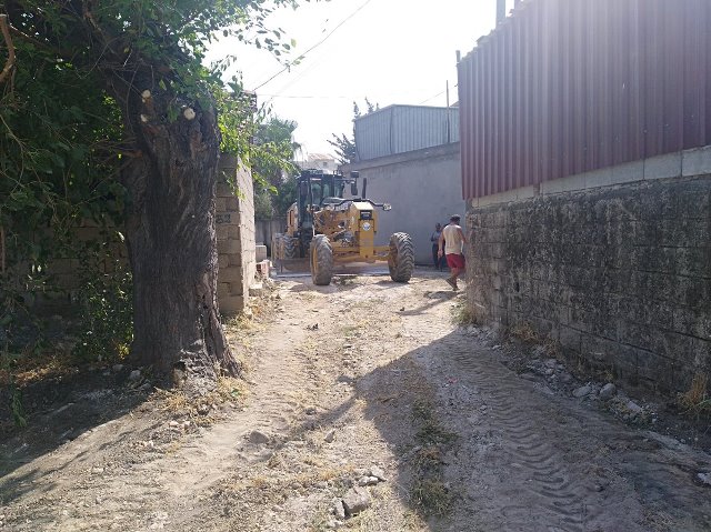 Antakya Belediyesi iki mahallede yol çalışması yaptı